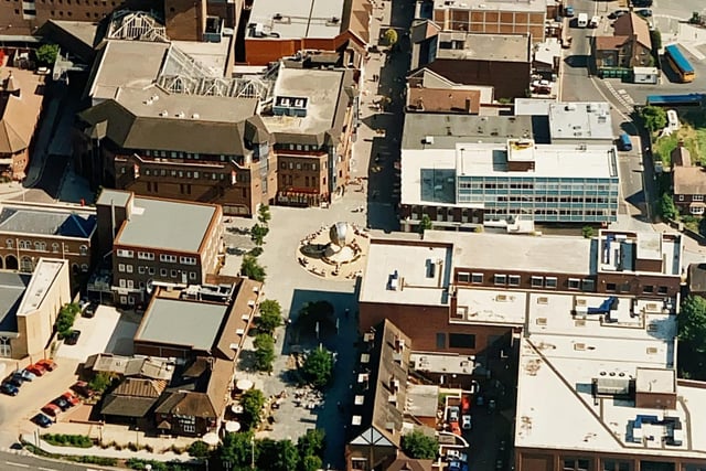 Horsham town centre pictured from above, showing the Shelley Fountain in the late 1990s