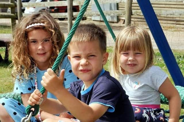 Children enjoy the playground area at Sharnfold Farm