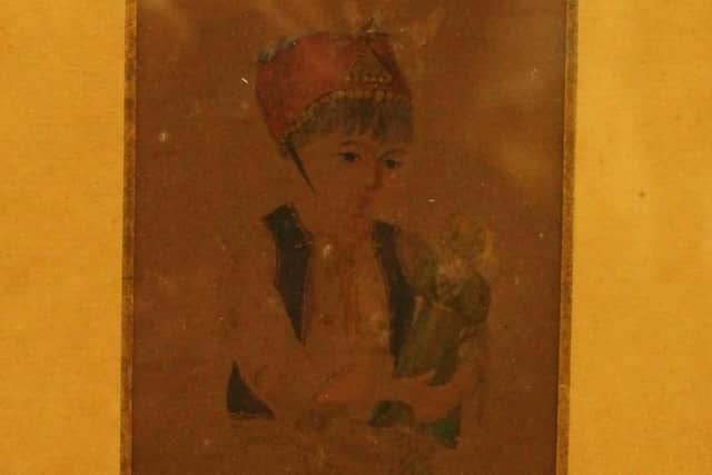 Watercolour portrait of Dean Burgon as a child in his Greek dress, painted by Mary Ann Burgon