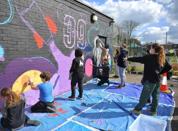 Mural spraying at Club 39 Bognor youth club. Pic S Robards SR2204042 SUS-220404-131938001