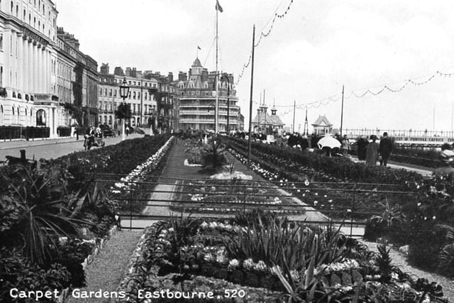 Postcard from 1914, showing Eastbourne Carpeet Gardens looking westwards towards the pier SUS-220504-121857001