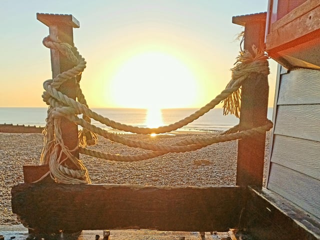 Sunrise near the Wish Tower, taken by Tracy Owen. SUS-220504-102017001
