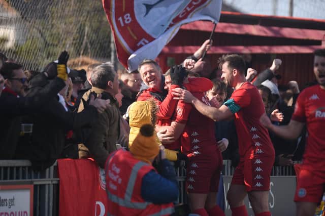 Players and fans celebrate Calum Kealy's goal - which proved the winner - at Woodside Road last Saturday v Haringey / Picture: Marcus Hoare