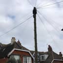 BT poles and telegraph wires in Gore Park Road, Eastbourne SUS-220704-114034001