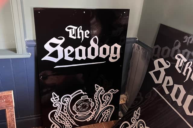 The Seadog's new signs ready to go up. SUS-220804-095536001