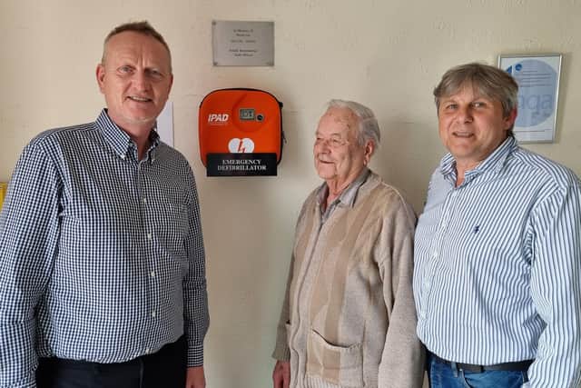 Lund Bros & Co Ltd's former managing director, Bill Lee (centre) has paid for an Automated External Defibrillator (AED) to be fitted in the reception area. Bill is pictured with his successor, Leigh Padley (left) and technical director Nigel Standen. SUS-220804-105628001