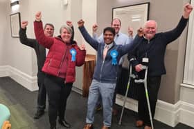 Mustak Miah celebrates his win with fellow Conservatives