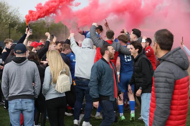 Worthing fans celebrate after victory over Bowers and Pitsea confirms they are Isthmian premier division champions - and are promoted to the National South / Pictures: Worthing FC-Mike Gunn