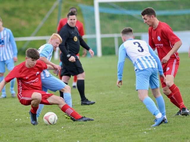 Action from Shoreham's 2-0 win at Worthing United in division one of the SCFL / Pictures: Stephen Goodger