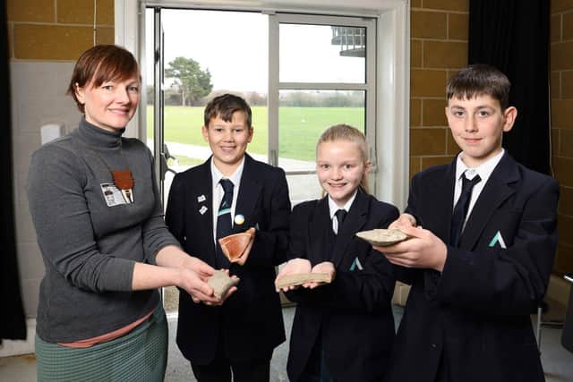 Year-seven students at The Angmering School were shown finds from the late Iron Age and early Roman periods by David Wilson Homes and its partner Thames Valley Archaeological Services