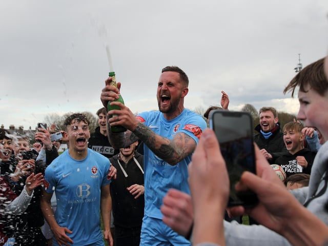 The celebrations get started after Hastings United clinch the Isthmian south east title with a point at Faversham / Pictures: Scott White