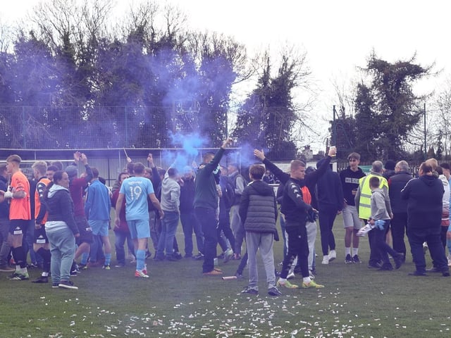The celebrations get started after Hastings United clinch the Isthmian south east title with a point at Faversham / Pictures: Scott White
