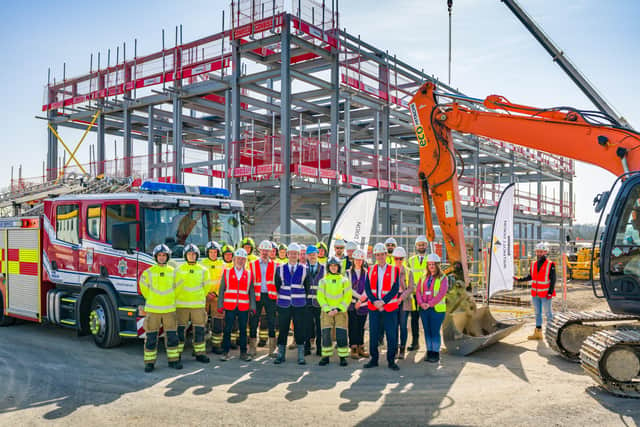 Representatives from the county council, fire and rescue service and Willmot Dixon at the site of the new fire station for Horsham