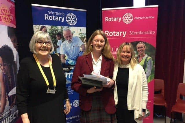 Flora Burleigh with Nicky Babbage-Clark from Worthing Rotary Club and Helen Holloway, head of English at Our Lady of Sion School