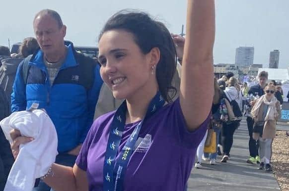 Chloe Evemy completed the Brighton Marathon on Sunday, raising more than £2,000 for the Chailey Heritage Foundation who cared for her disabled cousin Dan. Picture: Chailey Heritage Foundation.