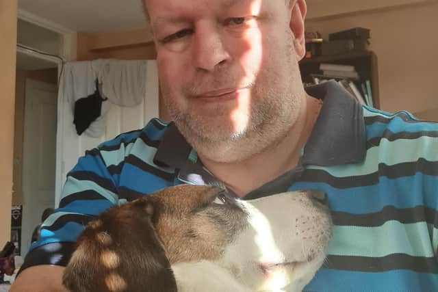 Eastbourne resident Peter Kitcher with his dog SUS-220413-144038001