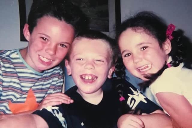 Chloe's cousin Dan (centre) was cared for by Chailey Heritage SUS-220413-145651001
