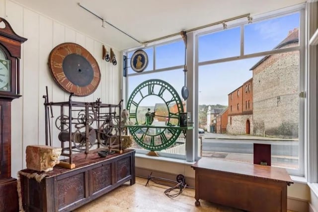 This antique clock showroom and workshop, with a two-bedroom maisonette over, is in North Street, Lewes SUS-220414-113049001