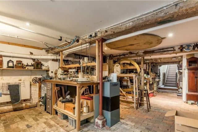 This antique clock showroom and workshop, with a two-bedroom maisonette over, is in North Street, Lewes SUS-220414-113330001