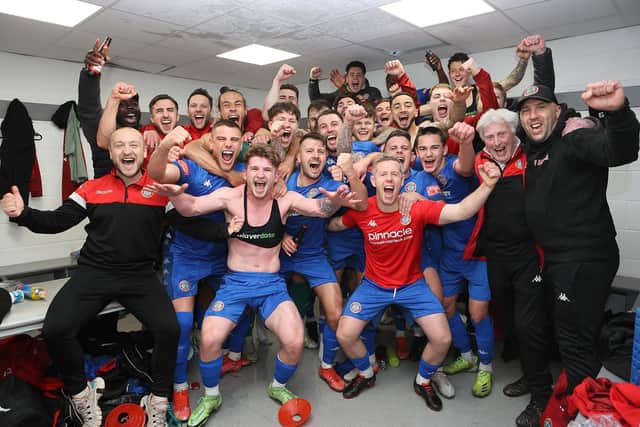 Worthing celebrate in the dressing room / Picture: Mike Gunn