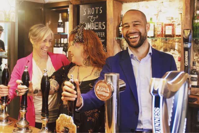 Daisy Cooper MP, Shoes Simes and Josh Babarinde OBE in the Dew Drop Inn, Eastbourne SUS-220414-132614001
