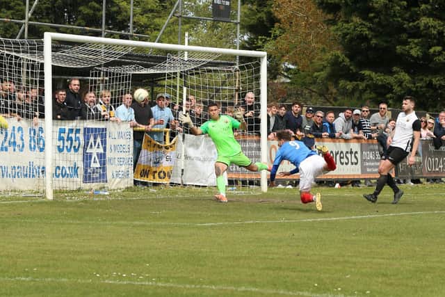 Joe Benn heads an equaliser for Littlehampton at Pagham - where a 3-2 win kept them in the driving seat for the SCFL title / Picture: Martin Denyer