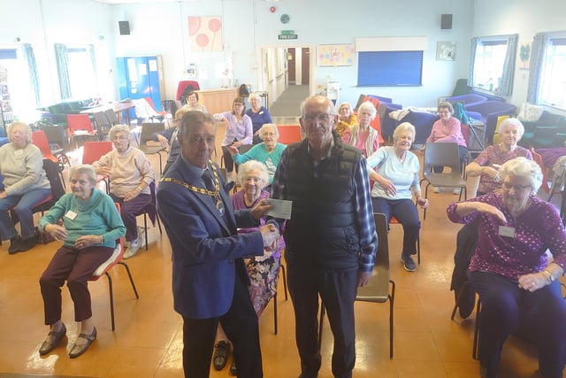 A grant of £100 has been given to the Charles Hunt Centre in Hailsham, one of a number of donations to community groups and voluntary associations given by Town Mayor Paul Holbrook after coming in under budget on his allocated allowance for the last financial year. Cllr Holbrook is pictured here handing over the cheque to Age Concern chairman Alan Faulkner. SUS-220419-112321001