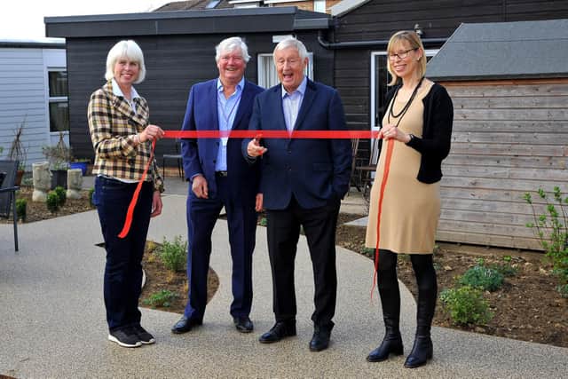From left: From left: Katie Watson, Phoenix Stroke Club trustee Don Burstow, Chris Tarrant and Emma Barnard at the ribbon cutting. Katie and Emma are the daughters of Phoenix founder Jenny Filby, who died aged 51 in 1990 of cancer. Pictures by Steve Robards