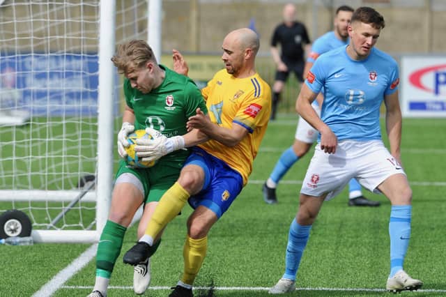 Action from Hastings United's 2-0 win at Lancing in the Isthmian south east division at Culver Road on Easter Monday / Picture: Stephen Goodger