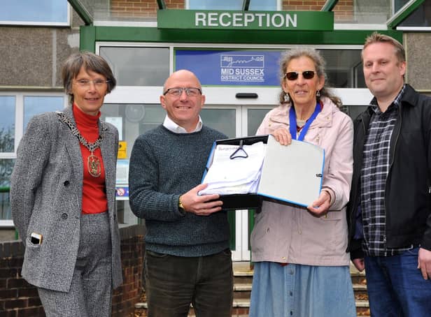 Burgess Hill Town Councillors hand in a petition to MSDC (L-R, Anne Eves, Robert Eggleston, Janice Henwood and Peter Chapman) . Pic S Robards SR2204192 SUS-220419-143932001