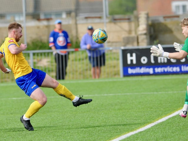Action from Hastings United's 2-0 win at Lancing in the Isthmian south east division at Culver Road on Easter Monday / Picture: Stephen Goodger