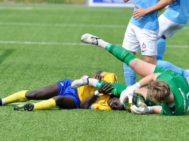 Action from Hastings United's 2-0 win at Lancing in the Isthmian south east division at Culver Road on Easter Monday / Picture: Stephen Goodger
