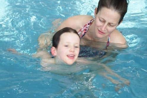 Rowan Cranston and Meredith enjoying swimming sessions thanks to the Dame Vera Lynn Children’s Charity. Picture: Morrisons.