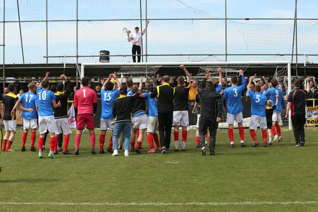 Golds players and fans celebrate the win at Pagham which sets up a title decider on Saturday v Bexhill / Picture: Martin Denyer