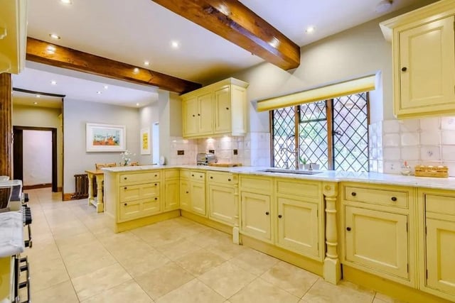 The kitchen/breakfast room features a range of modern wall and base units. Picture: Strutt & Parker - Horsham.