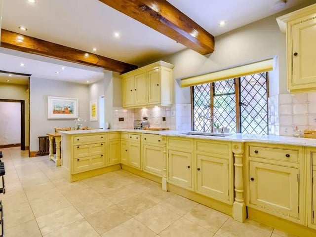 The kitchen/breakfast room features a range of modern wall and base units. Picture: Strutt & Parker - Horsham.
