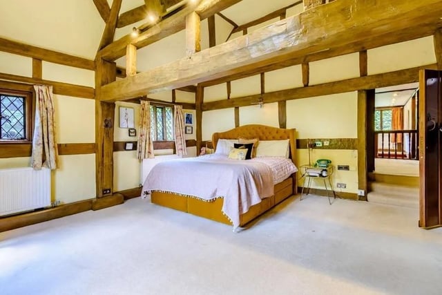 On the first floor are four bedrooms, including a principal bedroom with a vaulted ceiling. Picture: Strutt & Parker - Horsham.