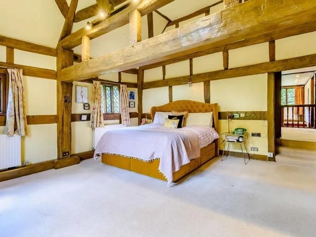 On the first floor are four bedrooms, including a principal bedroom with a vaulted ceiling. Picture: Strutt & Parker - Horsham.