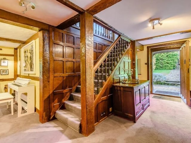 The welcoming reception hall has access to a rear aspect sitting room. Picture: Strutt & Parker - Horsham.