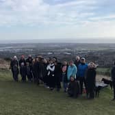 Tree planters gathered on the Downs. Picture from Eastbourne Borough Council SUS-220421-123436001