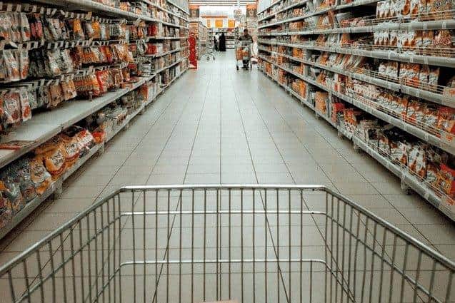Energy, fuel and food prices continued to soar and retailers reined in seasonal discounts.