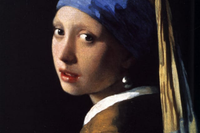 It looks like The Girl with the Pearl Earring by Vermeer - but it's not