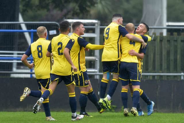 Eastbourne Town players celebrate after scoring against Horsham YMCA (Photo by Jon Rigby) SUS-200116-122839001
