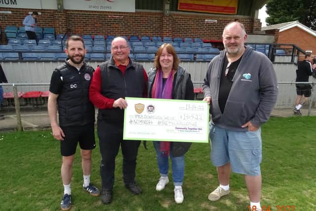 Horsham YMCA hand over funds raised to the Downslink charity
