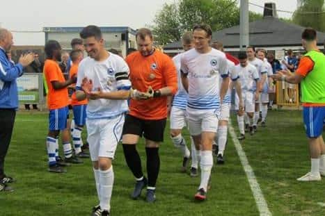 Roffey FC are given a guard of honour at Shoreham