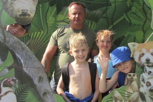 Jason Pulman (left) with his dad and siblings Kelsey, Tommy and Louis SUS-220426-171022001