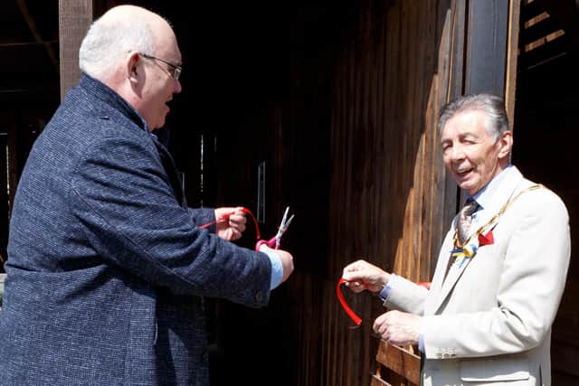 Cutting the ribbon, Richard Doyle (left) Mayor Cllr Paul Holbrook (right)
[Photographer: Dawne Pimm) SUS-220427-124431009