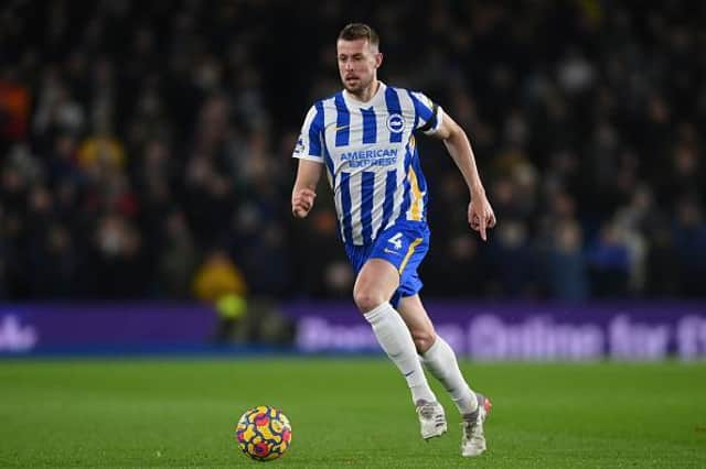 Brighton defender Adam Webster is eyeing a top 10 Premier League finish ahead of the trip to Wolves this Saturday