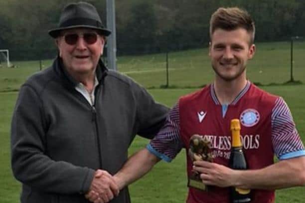 Jamie Bunn receives his player of the season award from stalwart fan Dave Pope