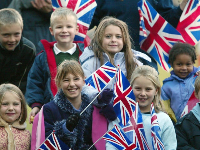 JPCT 24 October 2003 Queen visits Horsham. The Carfax C3440803a -photo by Steve Cobb ENGSUS00120120202164655